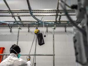 Ice block being lifted